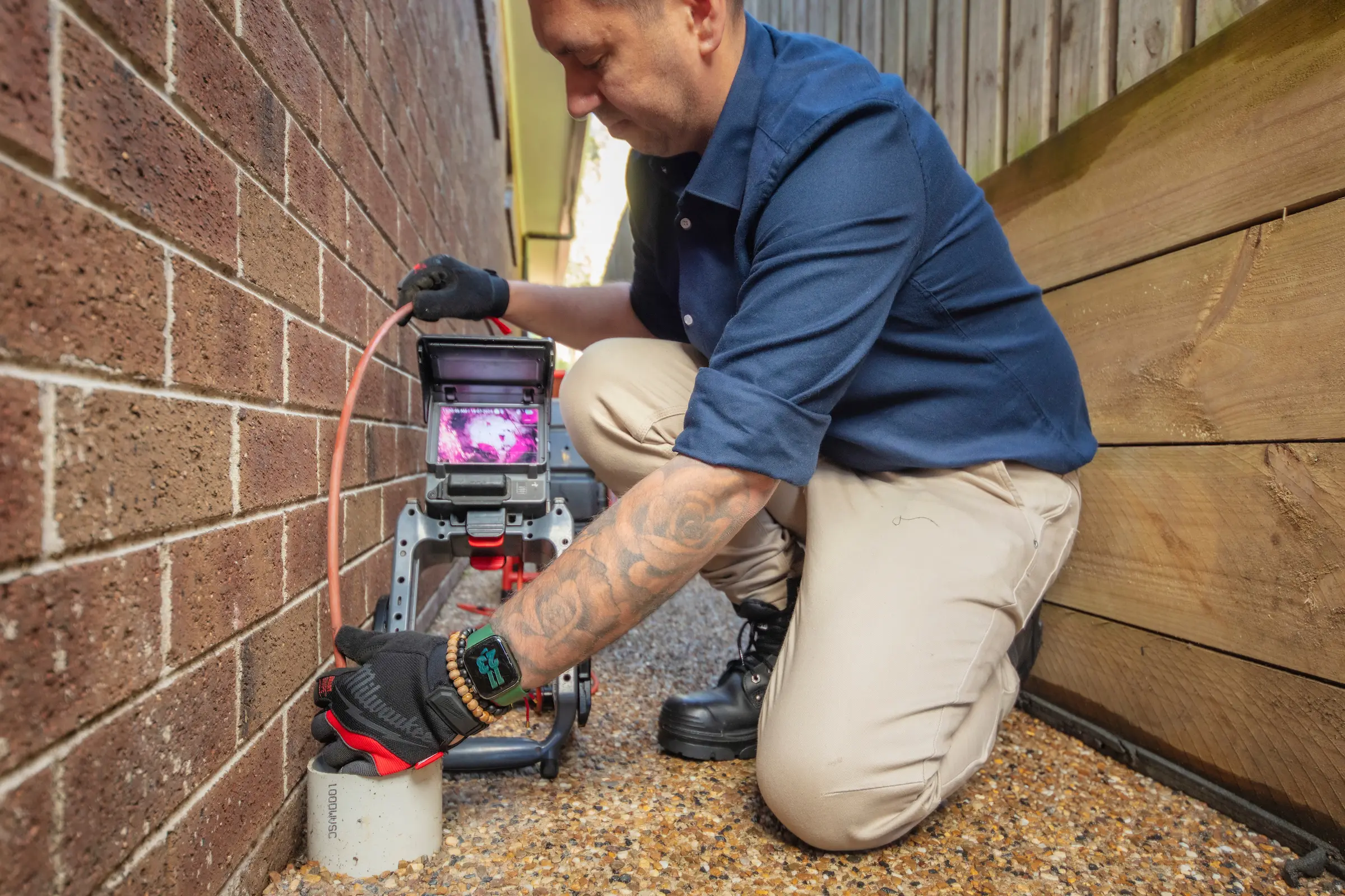 Christian inspecting a residential sewer with RIDGID CCTV equipment