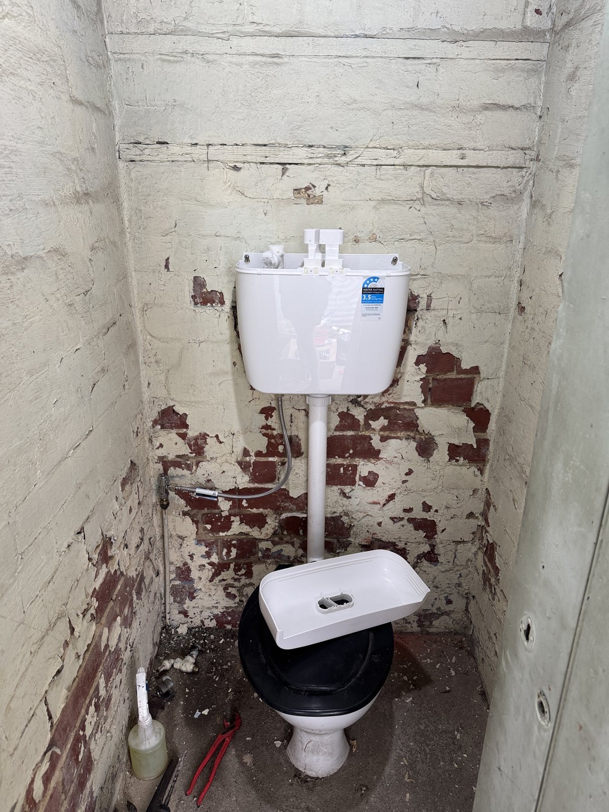 Toilet plumbing connections during replacement work