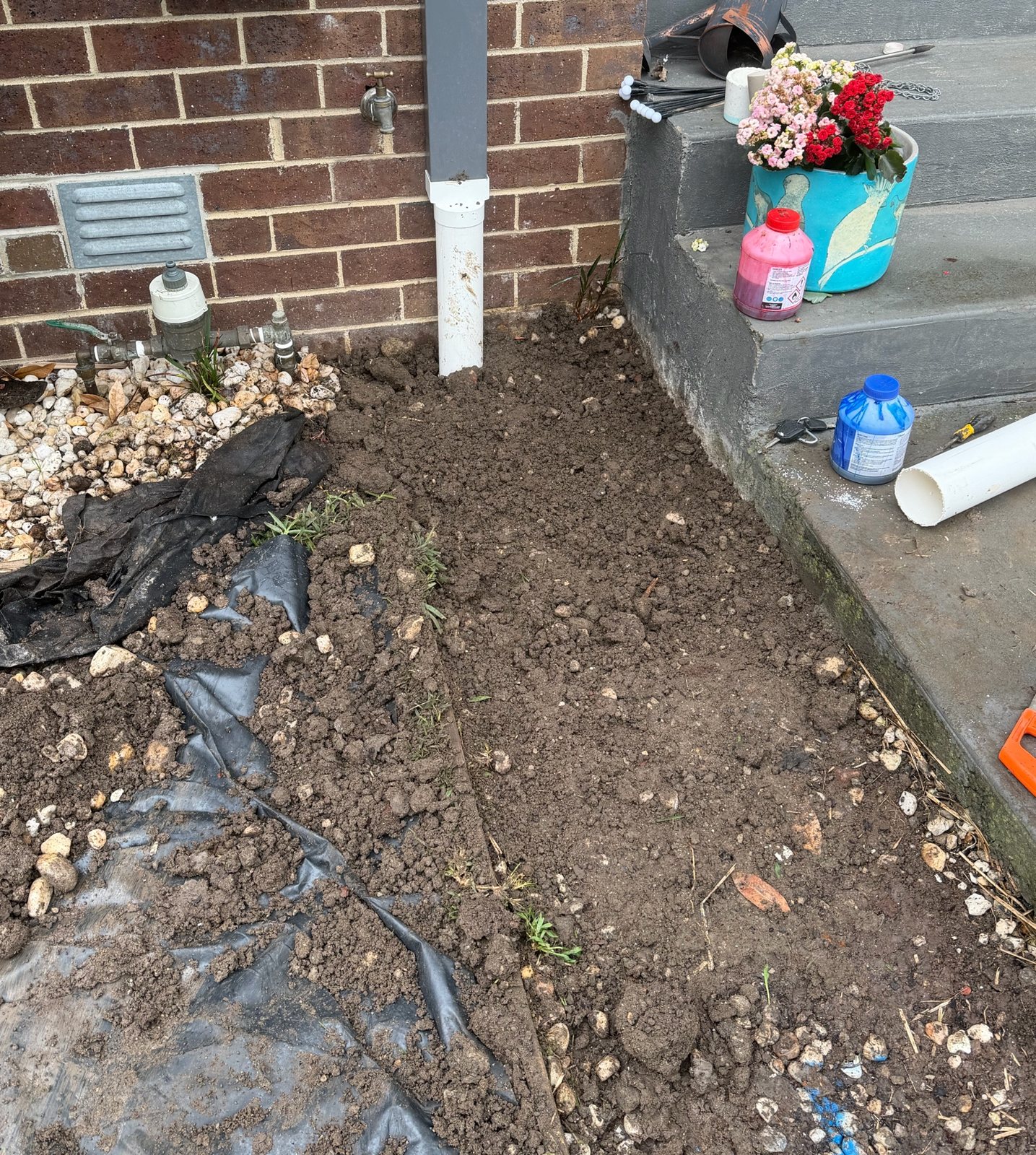 Stormwater excavation beside a downpipe at a Brunswick West unit complex