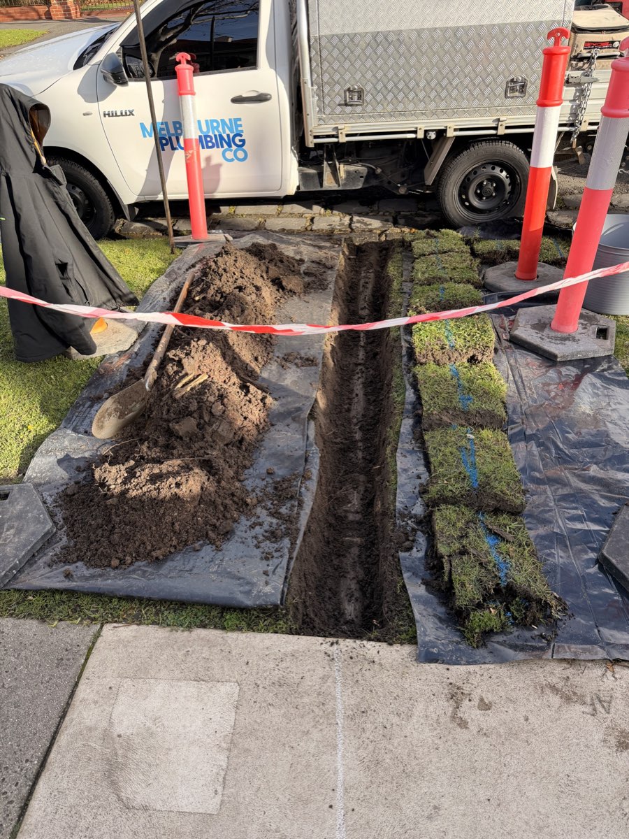 Melbourne Plumbing Co excavating a blocked stormwater drain in Essendon