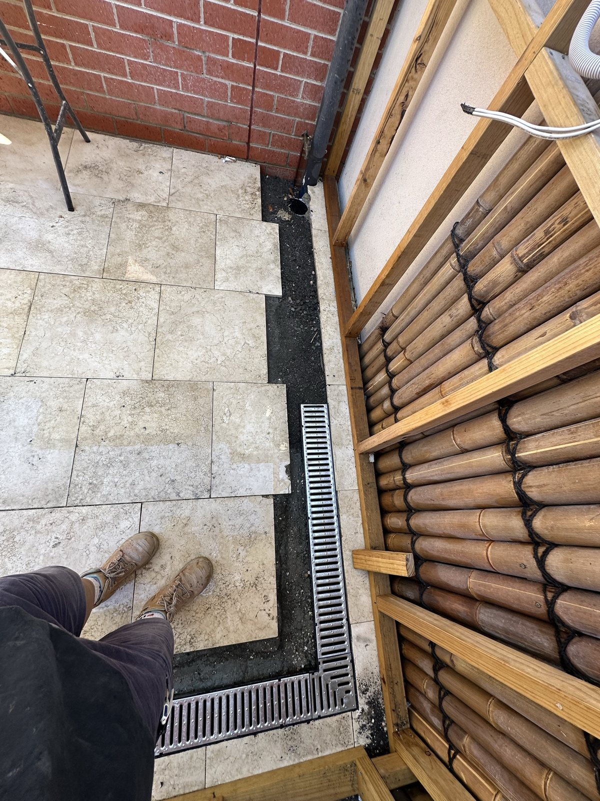 Finished stainless-steel courtyard strip drains in Essendon West