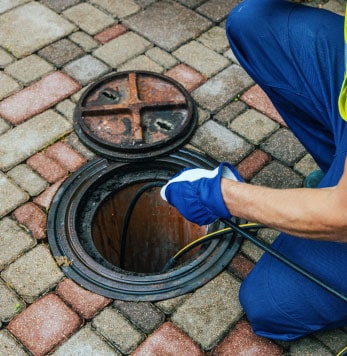 Plumber over open pipe access point