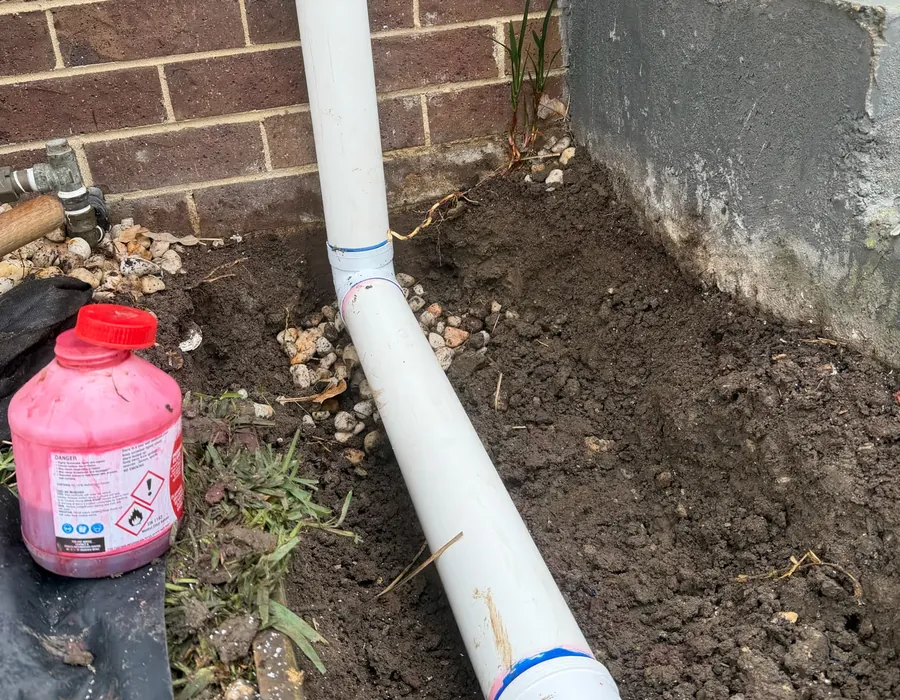 Replacement stormwater pipe connected to a downpipe during a Brunswick West repair