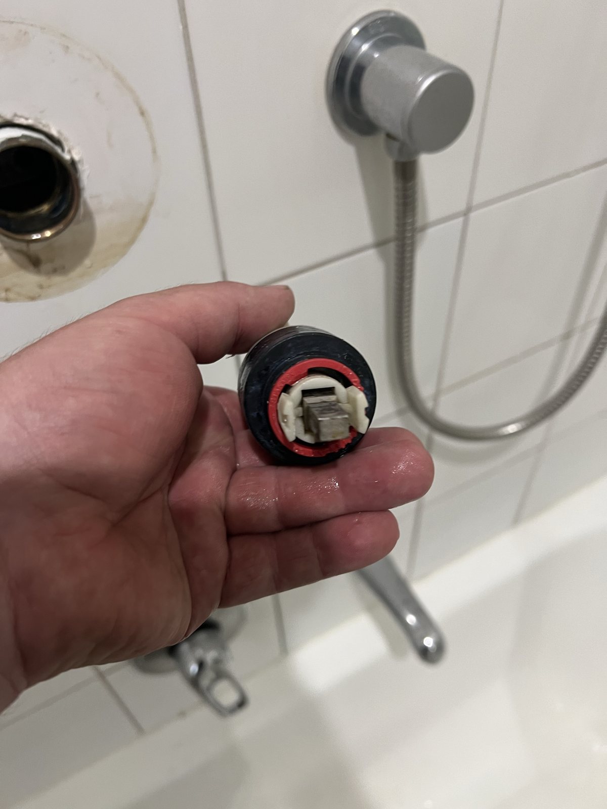 Shower-mixer cartridge removed from the wall for inspection in Pascoe Vale South